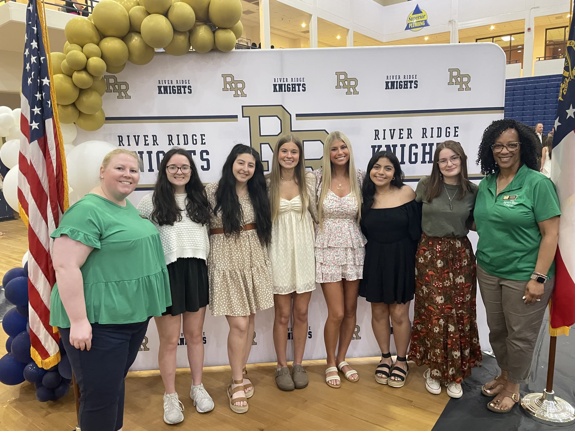 River Ridge scholarship recipients with their awards.